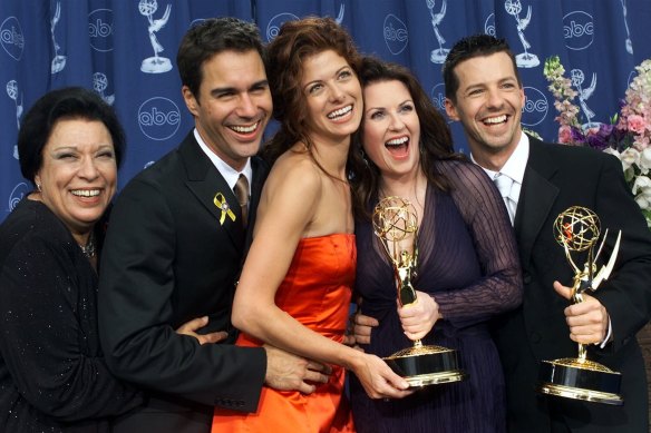 Will and Grace team: Shelley Morrison, from left, Eric McCormack, Debra Messing, Megan Mullally and Sean Hayes celebrate their wins at the 2000 Emmy Awards in Los Angeles.