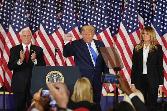 Donald Trump addresses supporters in the White House at an election night party.
