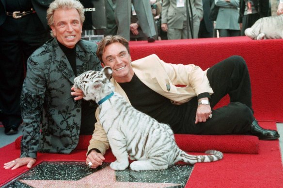 Siegfried Fischbacher, left, and Roy Horn, pictured in 1994 at their star on the Hollywood Walk of Fame.