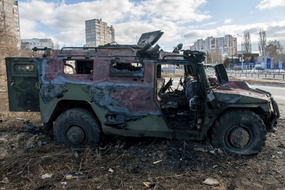 A damaged and burnt military vehicle is seen after fighting in Kharkiv, Ukraine, on Sunday