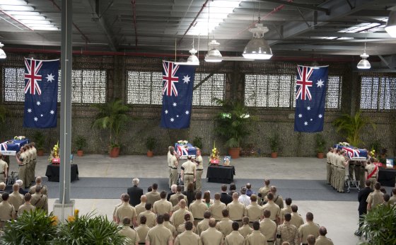 The ceremony at RAAF base in Amberley for Lance Corporal Stjepan Milosevic, Sapper James Martin and Private Robert Poate in September 2012. 