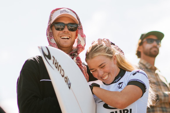 Ellie Harrison with coach and former pro surfer Cahill Bell-Warren before her upset win.