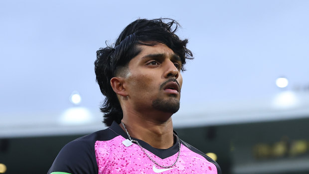 Jafer Chohan of the Sixers warms up during the BBL match between Sydney Sixers and Sydney Thunder
