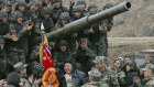 North Korean leader Kim Jong-un, centre, meets soldiers who took part in training in North Korea.