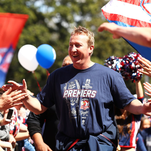 Trent Robinson celebrates the 2018 title with his Sydney Roosters fans.
