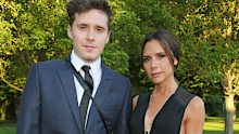 Brooklyn Beckham (L) and Victoria Beckham attend the Argento Ball for the Elton John AIDS Foundation in association with BVLGARI & Bob and Tamar Manoukian on June 27, 2018 in Windsor, England. 