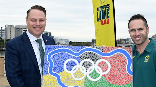 BRISBANE, AUSTRALIA - JULY 15: Lord Mayor of Brisbane Adrian Schrinner poses for a photograph with Australian olympian Brad Hore during the Australian Olympic Committee announcement of the Olympics Live locations across Australia at South Bank on July 15, 2021 in Brisbane, Australia. (Photo by Albert Perez/Getty Images for the AOC)