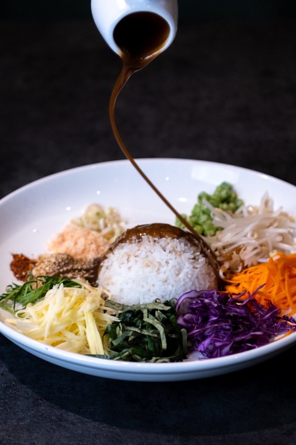 Khao yum (southern Thai rice salad) with green mango and nam budu dressing. 