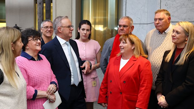 Prime Minister Anthony Albanese and Jodie Haydon with friends he grew up with in what was then the working class suburb of Camperdown in inner Sydney.