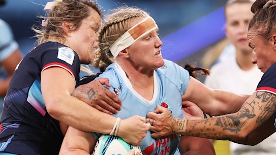 Emily Robinson carting the ball up for the Waratahs.