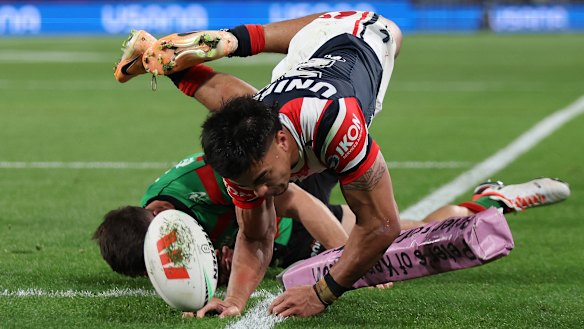 Junior Pauga scores a first-half try for the Roosters.