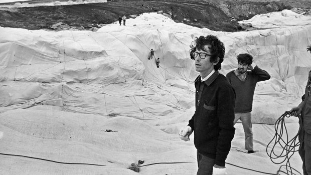 Christo and his assistants during the "wrapping" of Little Bay on October 9, 1969. 