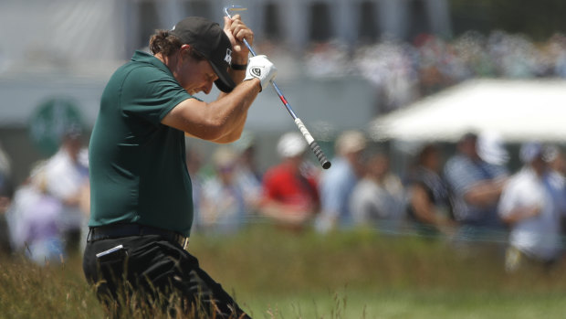 Course management: Phil Mickelson  blows up after a shot from the fescue  during the third round.