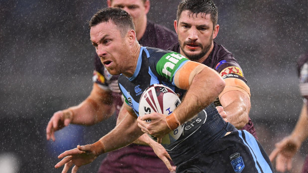 James Maloney charges through the driving rain on his return to the Blues in Perth. 