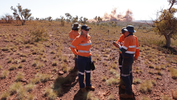 BHP principal operational readiness Hayley McCormack press the button for first blast at South Flank on Monday afternoon.