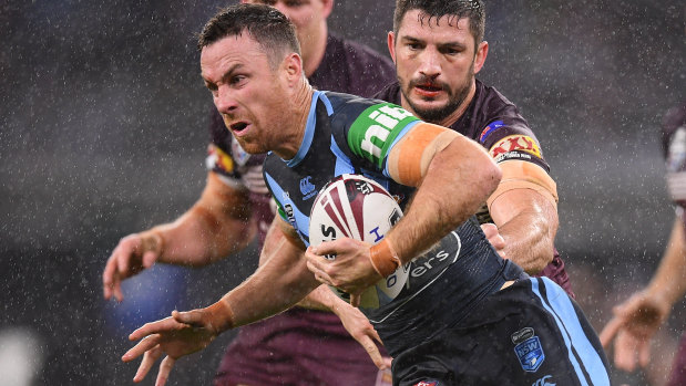 James Maloney charges through the driving rain on his return to the Blues in Perth. 
