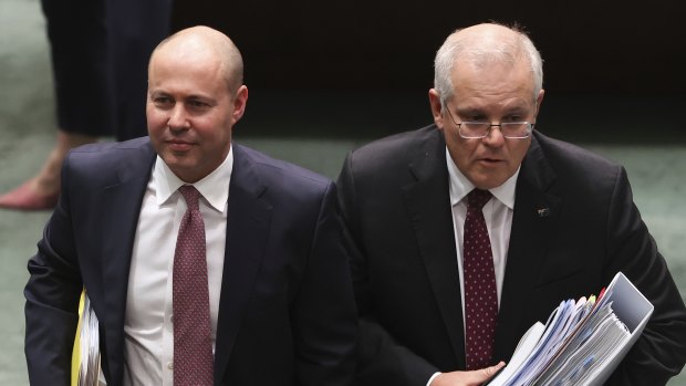 Treasurer Josh Frydenberg and Prime Minister Scott Morrison depart after Question Time at Parliament House in Canberra on Wednesday.