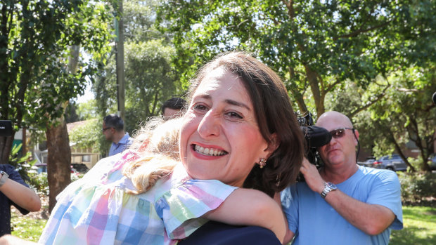 Premier Gladys Berejiklian celebrates in her electorate, Willoughby, on Sunday. 