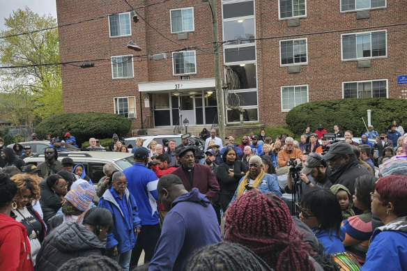 A crowd gathers were Se’Cret Pierce was shot. 