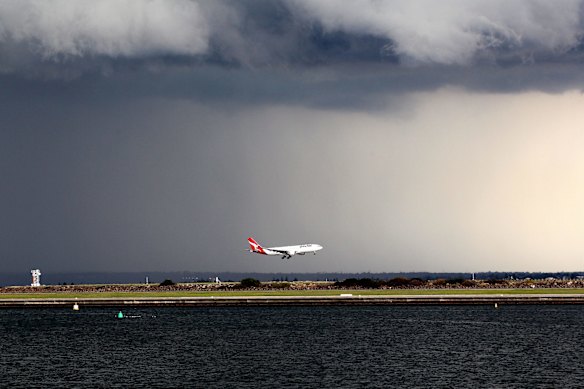 Sydney Airport’s third runway juts into Botany Bay.