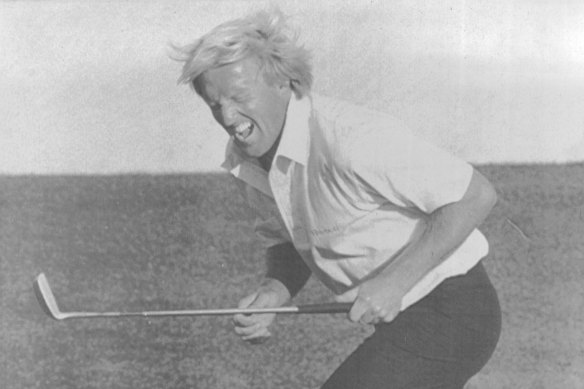 Norman reacts to missing a birdie shot on the 18th in 1987.