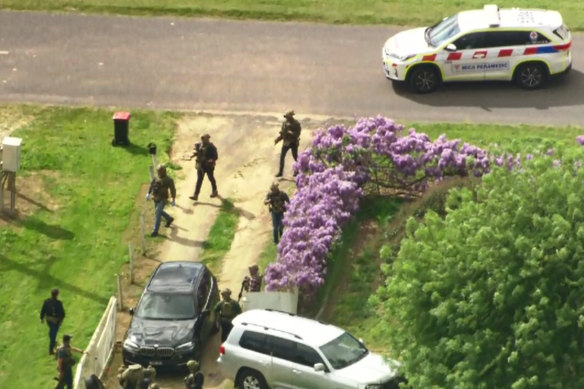 The Special Operations Group at an Ardmona property on Wednesday morning.