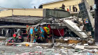 Video uploaded to social media shows damage to a road and shops in Port Vila.