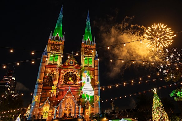 St Mary’s Cathedral in Sydney is lit up for the festive season.
