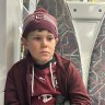 A devastated 11-year-old Carter McPherson on the train home from Suncorp Stadium.