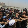 Massive wave of Iraqi protesters storm into Green Zone, occupy parliament