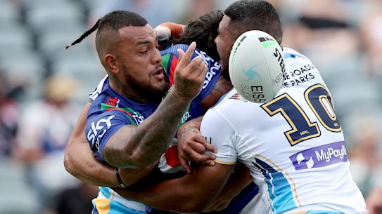 Warriors recruit Addin Fonua-Blake gets away an offload against the Titans on Saturday.