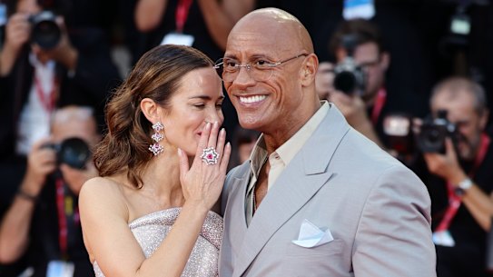 Emily Blunt and Dwayne Johnson attend the Venice premiere of The Smashing Machine.