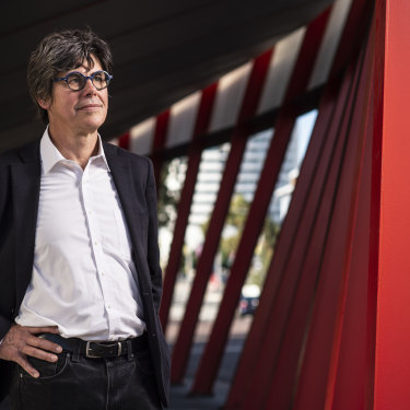 Former NSW state architect Peter Poulet in front of the Olympic amenities buildings at Homebush.