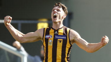 Jacob Koschitzke celebrates one of his five goals for the Hawks in their win over the Crows in Tasmania.