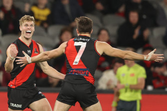 Ben Hobbs celebrates after scoring for the Bombers against Hawthorn.