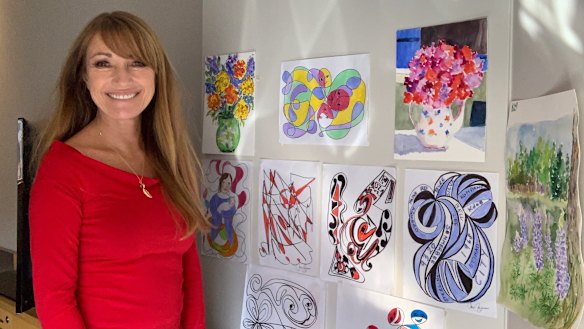 Making the most of quarantine: actor Jane Seymour, who took this photo of herself, has been painting in her Sydney hotel room after arriving from Los Angeles. She starts shooting new Australian film Ruby's Choice the morning after she gets out. 