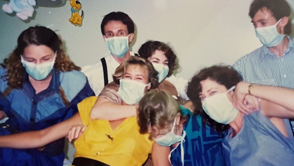 Young doctors Steve Robson, in the white shirt, and Kate Tree, far left, at a party at Rockhampton Base Hospital in 1988.