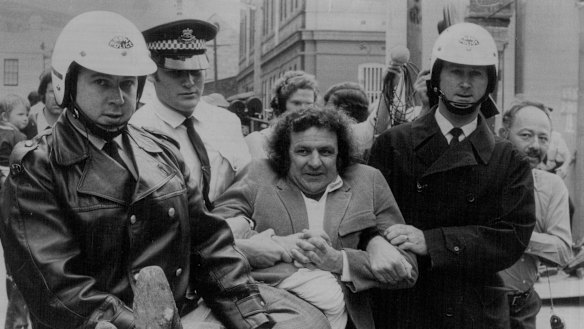 Jack Mundey is carried away from a protest in October, 1973. 