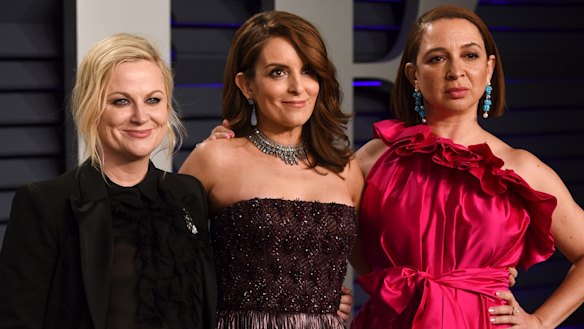 Amy Poehler, from left, Tina Fey and Maya Rudolph at the Vanity Fair Oscar Party.