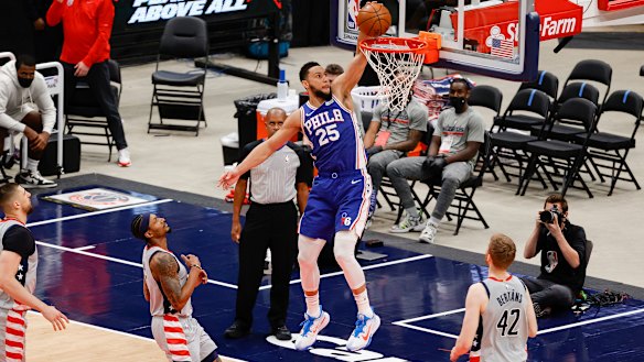 The Philadelphia 76ers’ Ben Simmons soars for a dunk in game four of the first round playoff series against the Wizards.