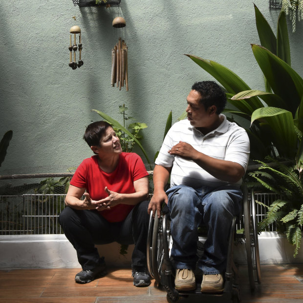 Peters with Alex Gálvez, one of the founders of Asociación Transiciones, a grassroots charity that salvages wheelchairs and gives them to the victims of gun violence.  
