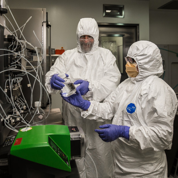 Professor George Lovrecz and Mylinh La at CSIRO's manufacturing facility for a pilot coronavirus vaccine in Clayton, Melbourne.