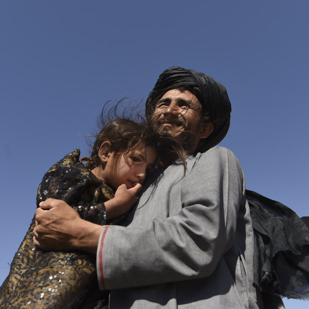 Abdul Haq and his four-year-old daughter Khadija.