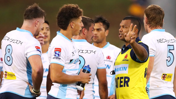 Mark Nawaqanitawase speaks to Kurtley Beale during Friday's trial against the Highlanders. 