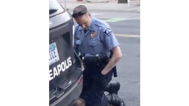 Police officer Derek Chauvin kneels on George Floyd, who is out of frame.