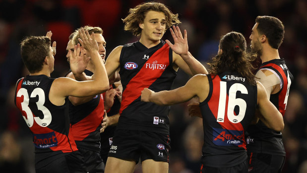 The Bombers celebrate a key early goal from young key forward Harry Jones.