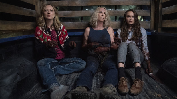 Judy Greer (left), Jamie Lee Curtis and Andi Matichak take on infamous killer Michael Myers in Halloween Kills. 
