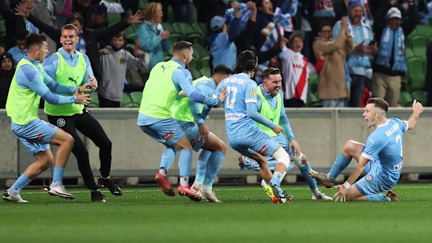 Scott Galloway celebrates after City’s third in injury time.