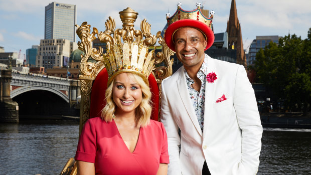 Weather reader Jane Bunn and Australian soccer legend Archie Thompson in their crowns.