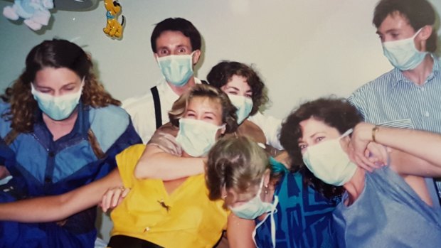 Young doctors Steve Robson, in the white shirt, and Kate Tree, far left, at a party at Rockhampton Base Hospital in 1988.